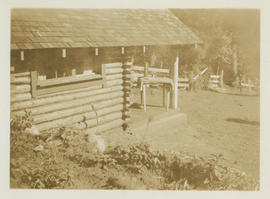 Side view, log cabin built by Albert Henry (Harry) Todd for his daughter, Virginia, as a playhouse