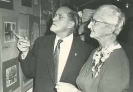 Mr. Hayward Todd and Miss A.M. Williamson looking at display for Gordon Head Mutual Improvement Society 70th anniversary