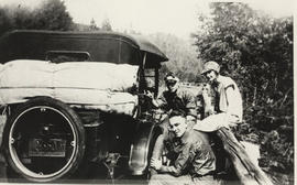 Changing a tire on the Malahat, 1927