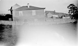 Boy standing in yard