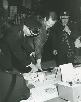 Hugh Curtis being fingerprinted as part of Police Week activities, 1971