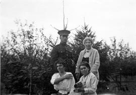 Mik Roberts and Emily Estlin with May Aitkens and Emily Maude Estlin (seated) on the Aitkens farm...