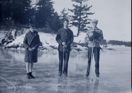 Gray family skating on Portage Inlet, 1929