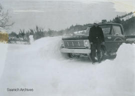 Corporation of Saanich truck on Hillcrest Avenue beside snow 3.5 feet deep