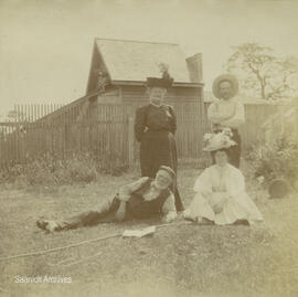 Elizabeth Laura and Robert Oates at left with others