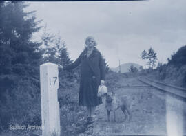 Edith Gray at 17 mile post along E & N Railroad, 1932