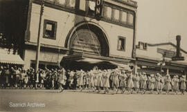 Victoria Girls Band marching in parade, May 1930