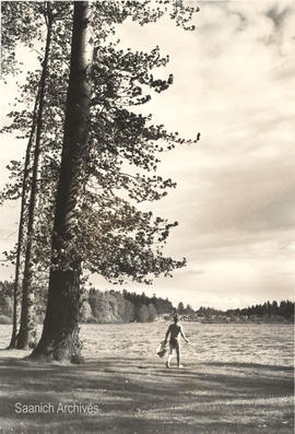 Boy on the beach at Elk Lake