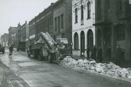 Saanich snowplow cleaning up Johnson Street