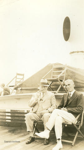 Tom Hall and Mr Arnold on board vessel, 1935