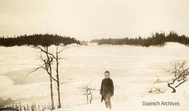 Boy with skates, Portage Inlet, 1928