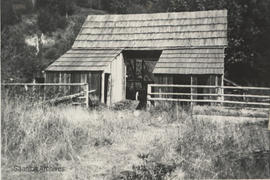 Old cabin used as garage for Mr McMorran's Model T automobile