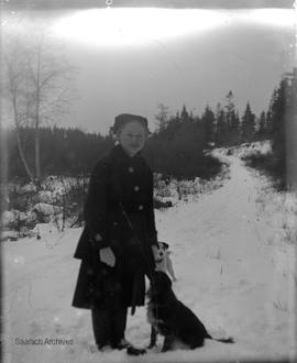 Alice Mary Girling with dogs in the snow