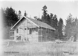 Members of the Little family outside their home at 885 Hyacinth Avenue during construction