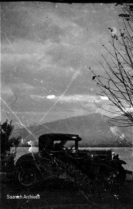 Jim Randall's car beside water [Pridmore family collection]