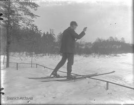 Skiing over the fence at the Girling's Swan Lake property