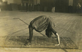 Young woman doing gymnastics