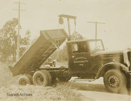 Saanich Municipality No. 3 truck dumping its load