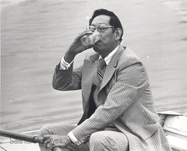 Mayor Lum testing drinking water on Swan Lake, 1975