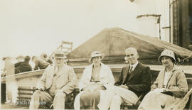 Tom and Maude Hall with Mr and Mrs Arnold on board vessel, 1935