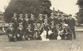 Postcard of Muggins the Red Cross dog with members of the Royal Naval Canadian Volunteer Reserve (RNCVR)