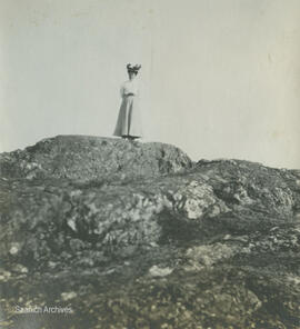 Woman standing on rocks