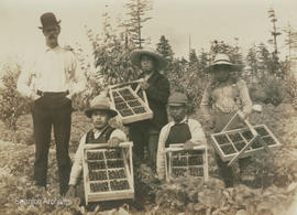 Geoffrey Vantreight with workers on the Vantreight strawberry farm in Gordon Head